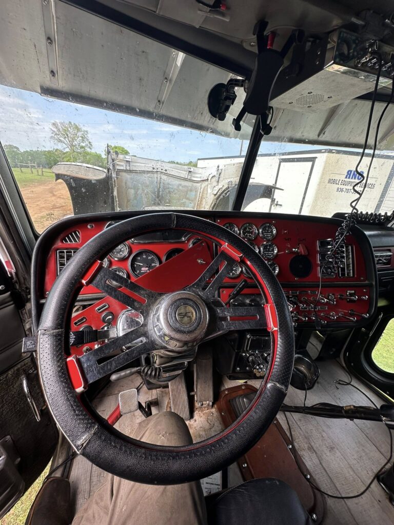 Interior cab of heavy equipment being inspected by mobile mechanic in East Texas