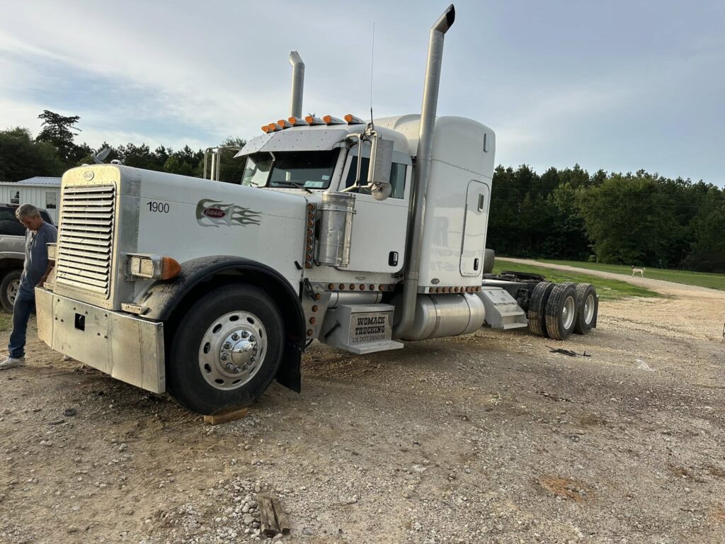 White semi truck receiving mobile mechanic service in East Texas