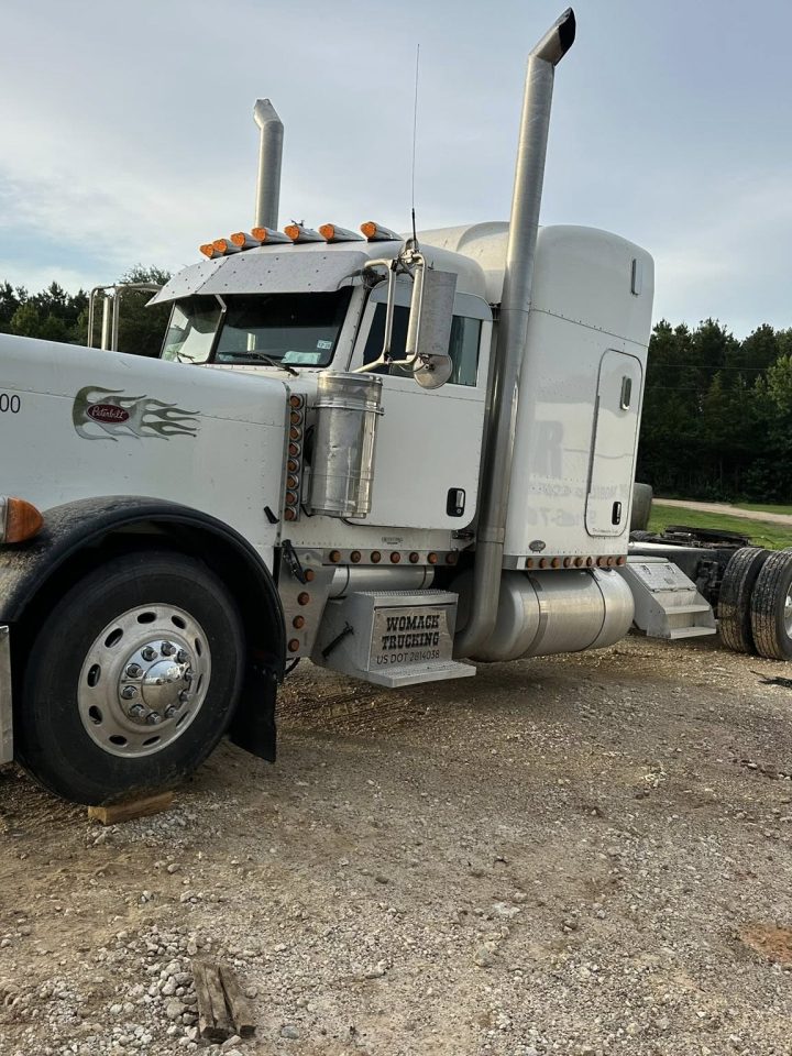White semi truck receiving mobile mechanic service in East Texas